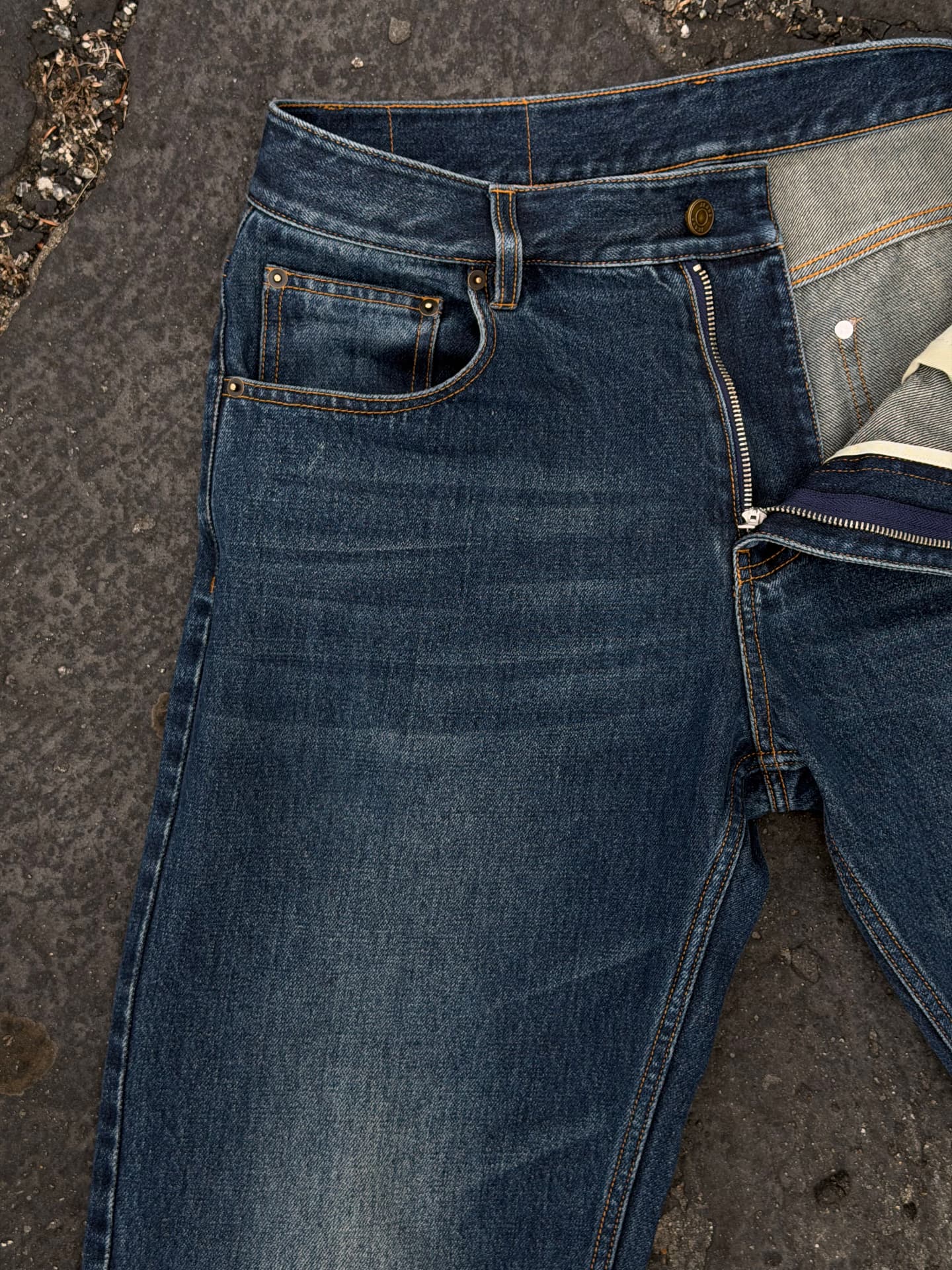 Waistband, button and zip detail